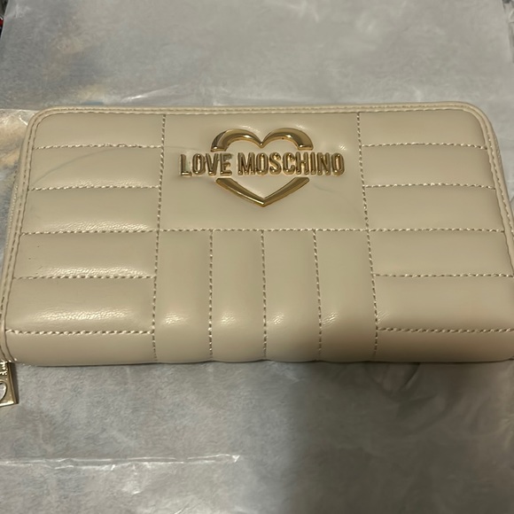 Love Moschino Handbags - New without tag Love Moschino Cream Quilted Wallet WITH GOLD HEART LOGO